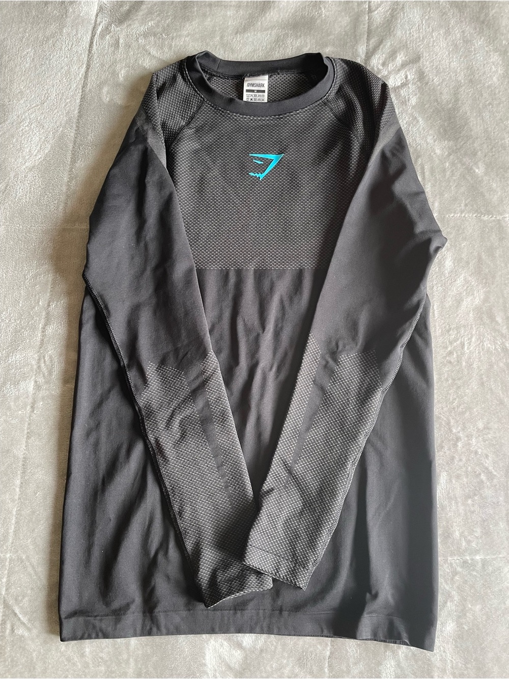 Gymshark Men’s Black Long-Sleeve Performance Top with Teal Logo
